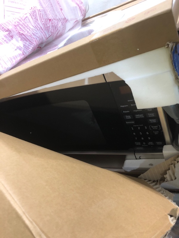Photo 1 of *USED** GE Countertop Microwave Oven,1, 200-watt Capacity, 2.0 Cubic Ft., 8 Auto Setting Cooking Settings, Child-Lock Technology, Kitchen Essentials for the Countertop, Dorm Room or Apartment, Stainless Steel
