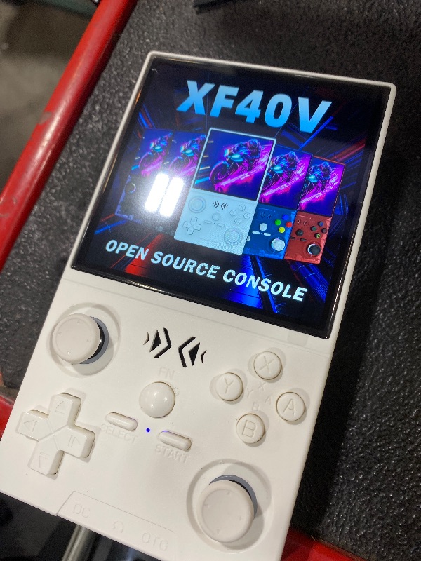 Photo 1 of XF40V Retro Handheld Game Console, Retro Gaming Console 4.0'' IPS Screen Linux System Built-in 64G TF Card, Open Source Linux System, Preloaded 20000+ Classic Games, Portable Video Gaming (White-64G)