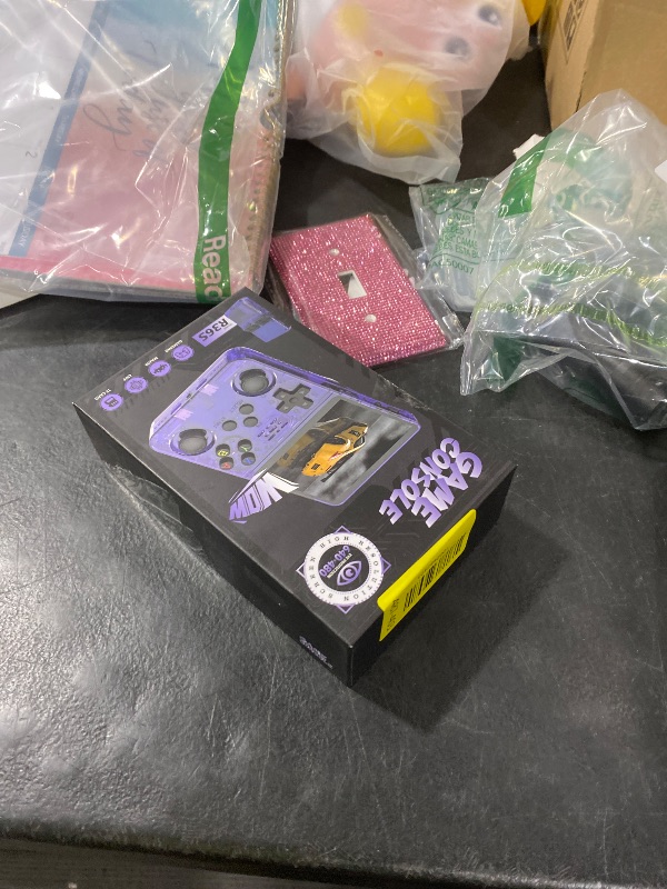 Photo 1 of R36S Retro Game Console, Handheld Game Console with 3.5-in IPS HD Screen?Video Game Consoles with 64GB Memory, Ultra-Long Standby Time, Perfect for Travel & Outings, Gift for Adults Teens Kids (Black)