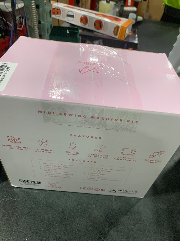 Photo 1 of CraftBud Mini Sewing Machine for Beginners, Dual Speed Small Portable Sewing Machine for Kids and Adults with Extension Table, 48 Piece Gift Set Includes, Pedal, Projects Book, Light and More, Pink