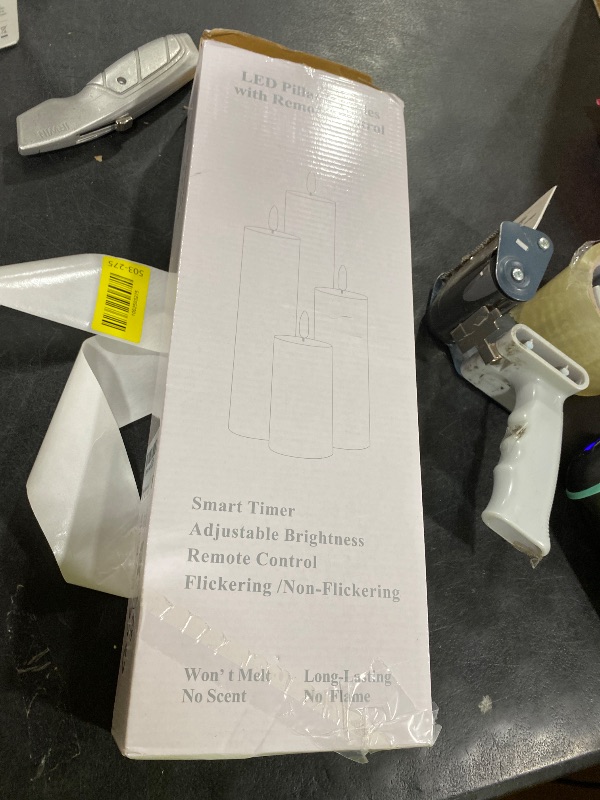 Photo 1 of Eywamage White Real Wax Flameless Pillar Candles with Remote, Flickering Flat Top LED Battery Candles Set of 3