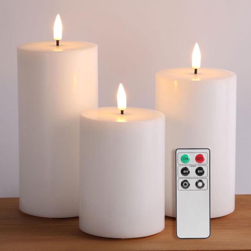 Photo 1 of Eywamage White Real Wax Flameless Pillar Candles with Remote, Flickering Flat Top LED Battery Candles Set of 3