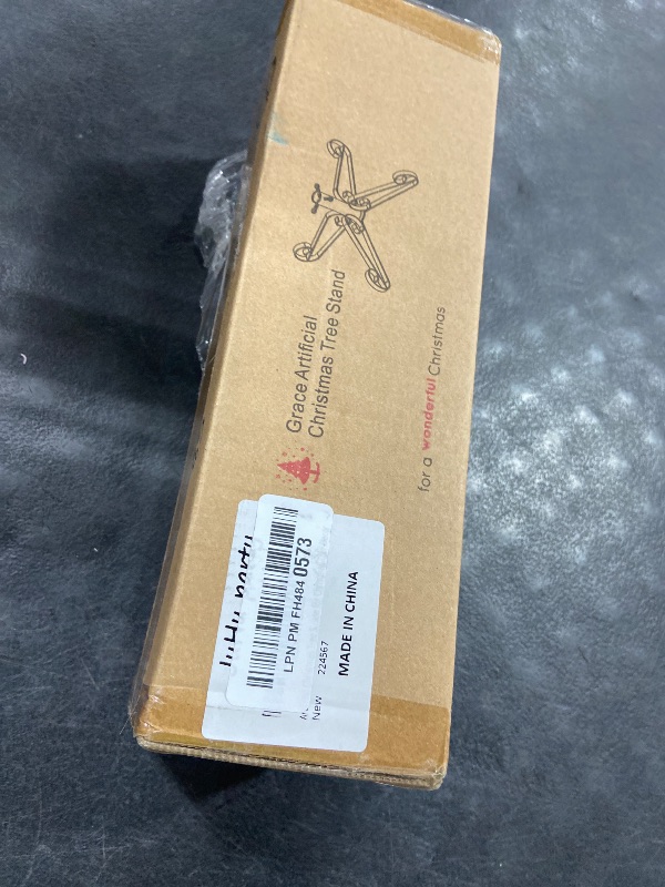 Photo 1 of Christmas Tree Stand for Artificial Trees 4 to 8 Foot Christmas Fake Tree Holder for Green & Red Indoor Outdoor Party Christmas Tree Ornaments Fits Up to 1.4" Xmas Tree Trunks