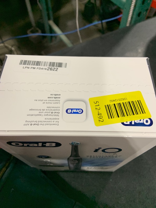 Photo 1 of Oral-B iO Deep Clean + Protect Rechargeable Electric Toothbrush, Black with a iO Series 7 Toothbrush, 2 Replacement Brush Heads, and a Charging Travel Case