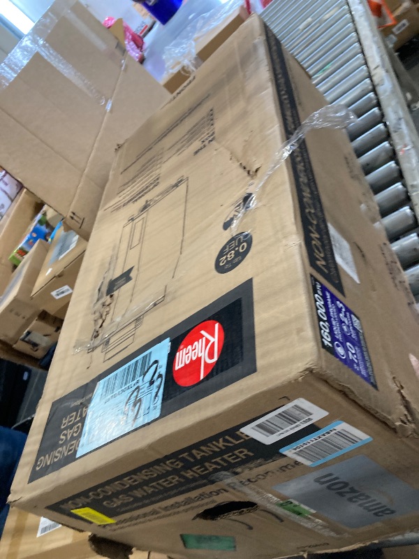 Photo 1 of ** DAMGE MINOR / UNTESTED* ** Rheem RTG-70DVLP-3 High Efficiency Non-Condensing Indoor Tankless Liquid Propane Water Heater 7.0 GPM, 160,000 BTUs