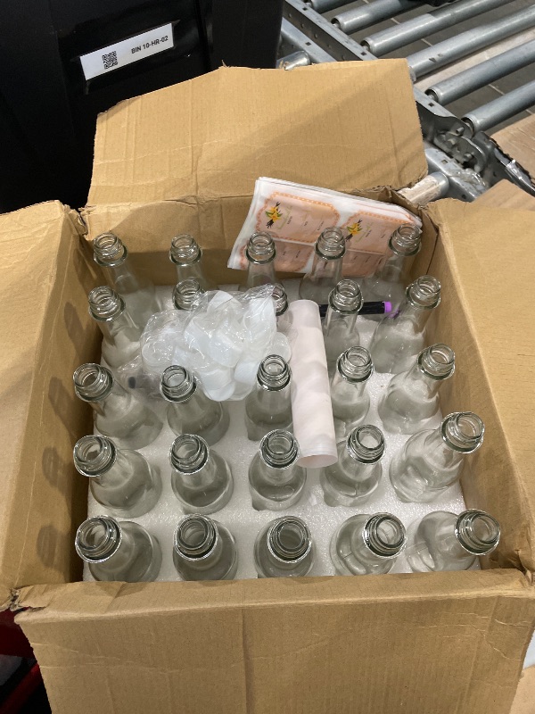 Photo 1 of  24 Pcs Long glass Plastic Bottles with Pourer 25 oz Empty Clear Wine Liquor Bottles Pour with 24 Pourers for Home Party Bar Kitchen
