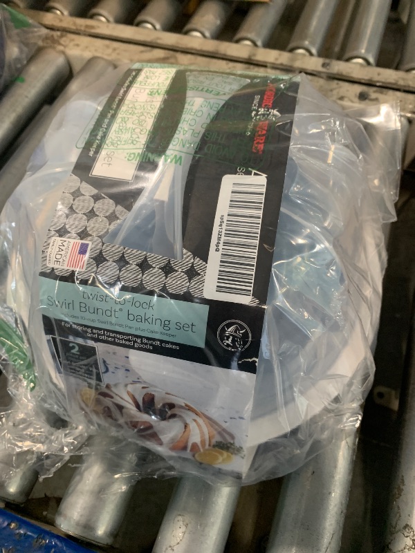 Photo 1 of ** SOLD AS IS, NO REFUND/RETURN** SEE COMMENTS!!
Nordic Ware Formed Swirl Bundt with Keeper, 10 Cup, Twilight Blue