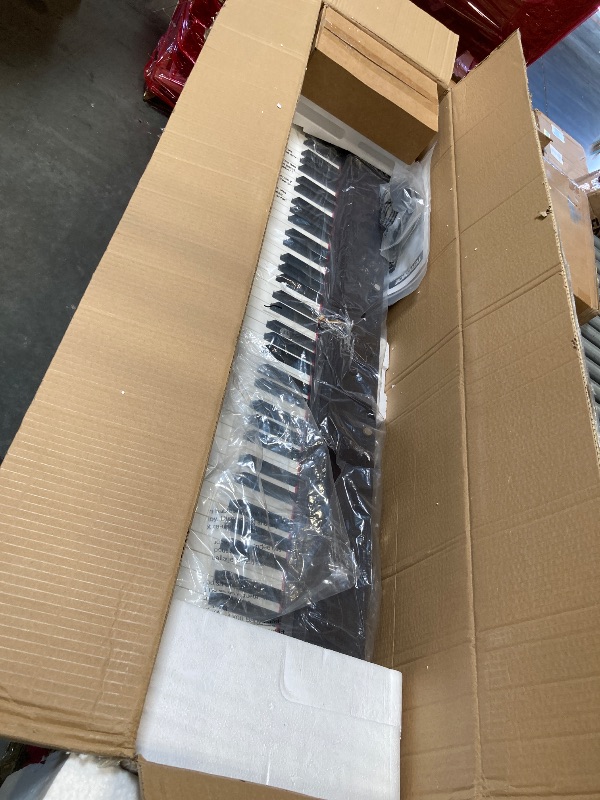 View 2 of *FAKE piano/**Look at picture **
Keyboard Piano Electric 88 Key Piano keyboard: 88 Key keyboard Piano Semi-Weighted Full Size Premium Sound MIDI Headphone Jack Triple Pedal Compact Design for Beginners to Professionals