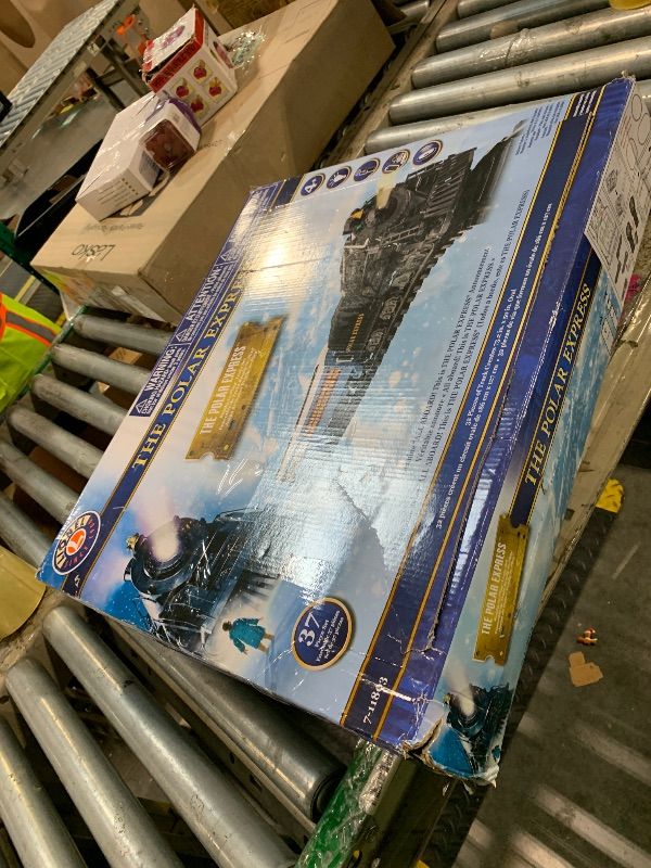 Photo 1 of ** FACTORY SEALED *** Lionel The Polar Express Battery Powered Train Set w/Bluetooth, Water Vapor Smoke, Lights, & Movie Sounds, 2-Rail Plastic Ready-to-Play Track System, Toy Train Set for Kids Ages 4+