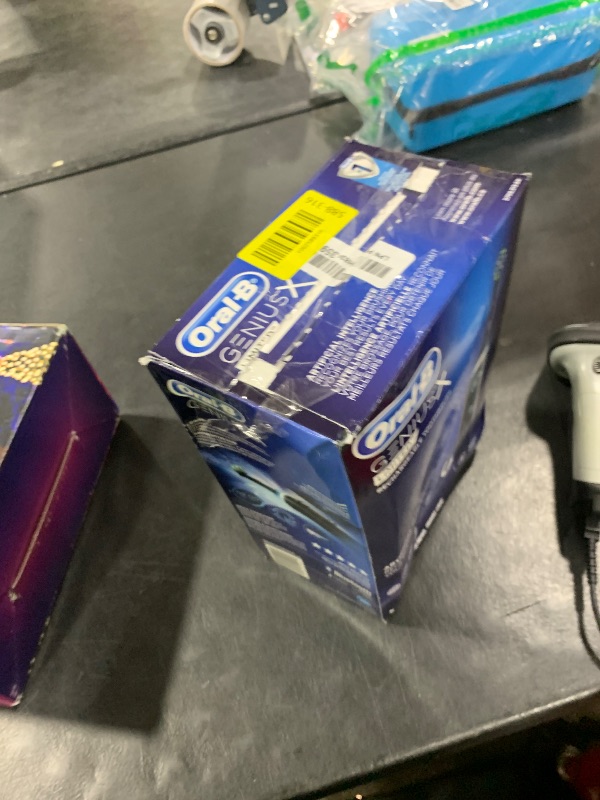 Photo 1 of Oral-B Genius X Limited Rechargeable Electric Toothbrush with 1 Replacement Brush Head, Travel Case, Midnight Black