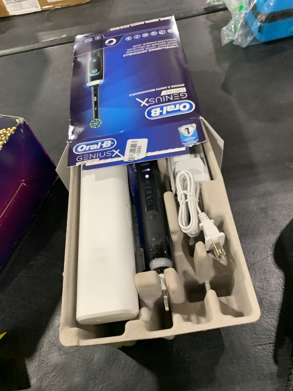 Photo 1 of Oral-B Genius X Limited Rechargeable Electric Toothbrush with 1 Replacement Brush Head, Travel Case, Midnight Black