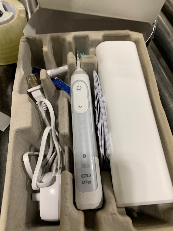 Photo 1 of Oral-B Genius X Limited Rechargeable Electric Toothbrush with 1 Replacement Brush Head, Travel Case, White