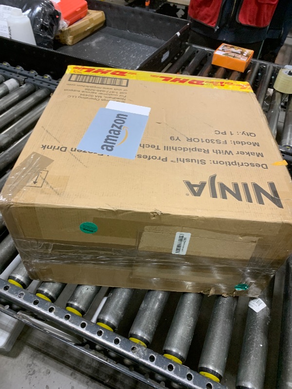 Photo 1 of Ninja SLUSHi Professional Frozen Drink Maker with RapidChill Technology, 88 oz. Frozen Drink & Slushie Machine, 5 Preset Programs, Frozen Margaritas, Frappés, and More, Orange Mango, FS301OR