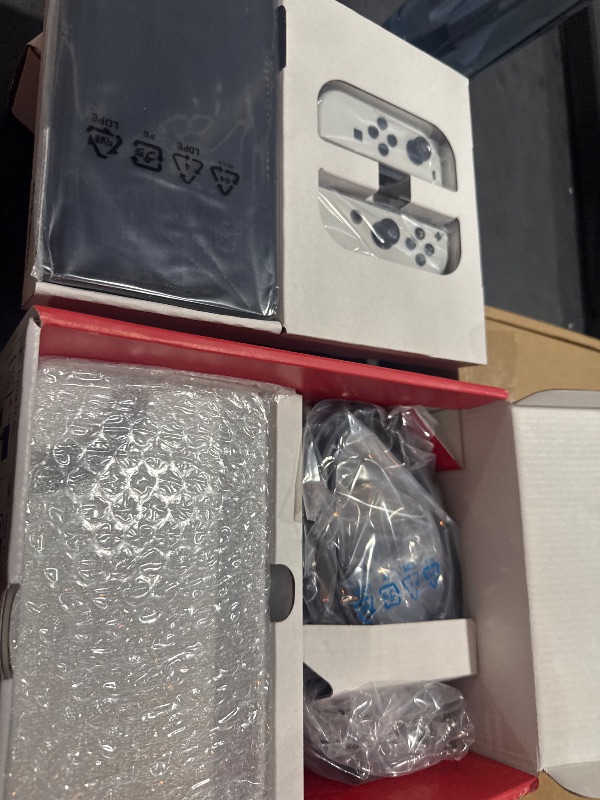 Photo 1 of Nintendo Switch – OLED Model w/White Joy-Con