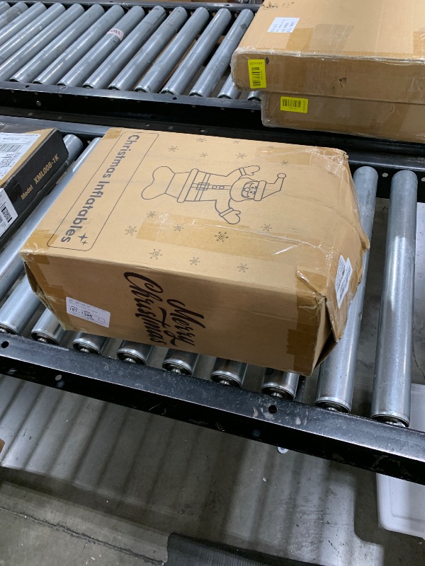 Photo 1 of *USED** Danxilu 14FT Giant Christmas Inflatables Snowman Holding Garland Built-in Rotating LED Lights, Xmas Blow Up Inflatable Snowman Outdoor Decoration for Yard Lawn Garden Patio Holiday Party