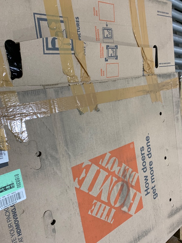 Photo 1 of The Home Depot 65 lb. TV Box