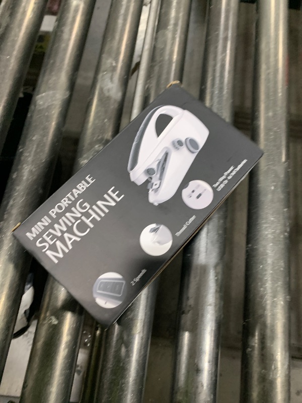 Photo 1 of  Handheld Sewing Machine,Two dear,Mini sewing machine,Easy to Use and Fast Stitch Suitable for Clothes,Fabrics, DIY Home Travel Electric Handheld Sewing Machine.(Black) 