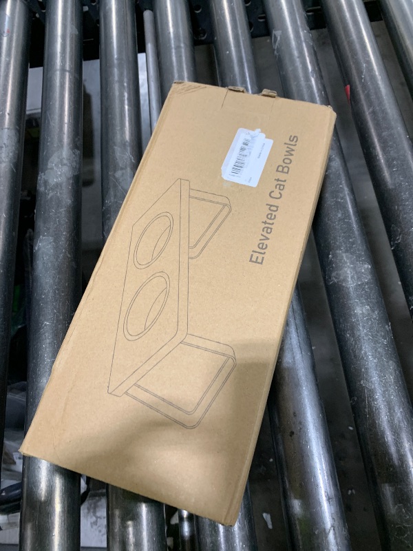 Photo 1 of  Upgraded Elevated Cat Bowls with Food Mat,15°Tilted Stand Anti Vomiting Raised Cat Dishes for Food and Water,2 Stainless Steel Bowls for Cats and Puppy 