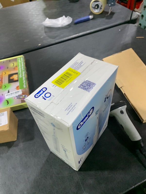 Photo 1 of Oral-B iO Deep Clean Rechargeable Electric Powered Toothbrush, White with iO Series 3 Limited, 2 Brush Heads and Travel Case - Pressure Sensor to Protect Gums - 3 Cleaning Settings - 2 Minute Timer