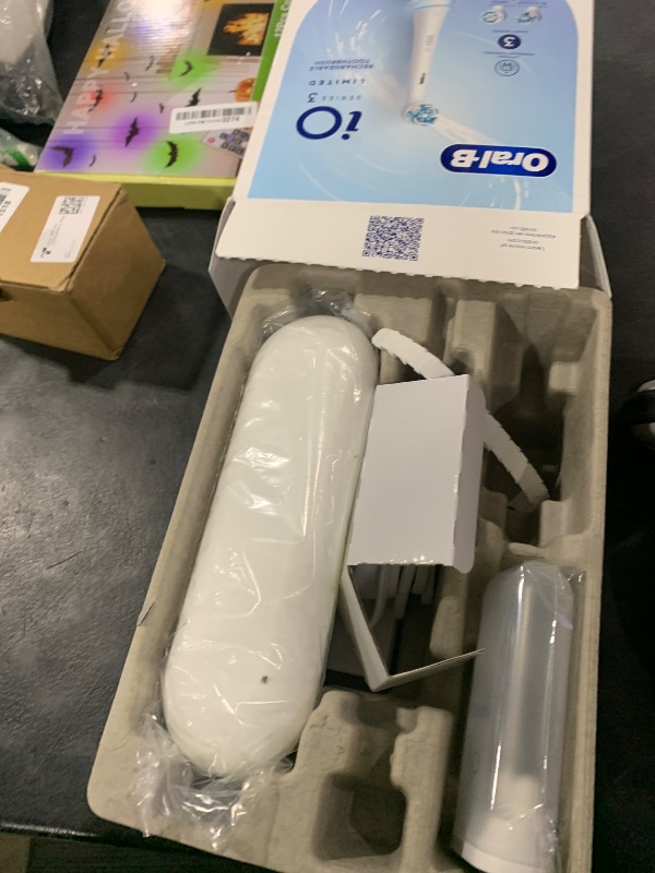 Photo 1 of Oral-B iO Deep Clean Rechargeable Electric Powered Toothbrush, White with iO Series 3 Limited, 2 Brush Heads and Travel Case - Pressure Sensor to Protect Gums - 3 Cleaning Settings - 2 Minute Timer