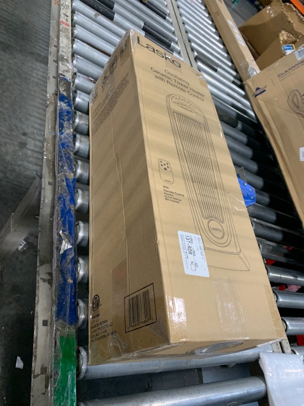 Photo 1 of **FOR PARTS ONLY**Lasko 1500W Ceramic Tower Space Heater with Remote, Thermostat, Timer & Widespread Oscillation, Portable Electric Heater for Indoor Use, Bedroom & Living Room, 751320