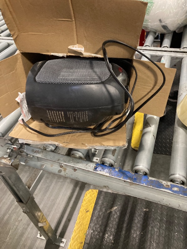 Photo 1 of **VERY USED**Amazon Basics Ceramic Space Heater, Portable Indoor Heating Solution, With Overheat and Tip-Over Protection, Thermostat, Non-Oscillating, 1500W, 7.52"D x 6.34"W x 9.45"H, Silver