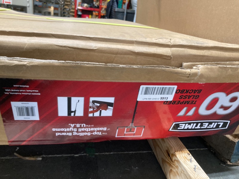 Photo 1 of **FACTORY SEALED**Lifetime Crank Adjust Bolt Down Basketball System, Tempered Glass Backboard, 60"
