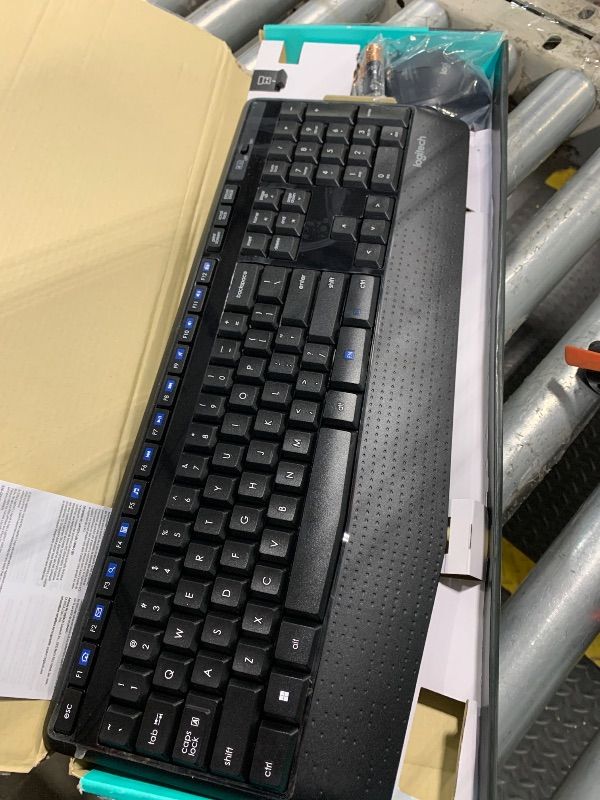 Photo 1 of ***The right lever at the back for lifting the keyboard is broken. THE DEVICE ITSELF WORKS VERY WELL**** Logitech MK345 Wireless Keyboard and Mouse Combo with Palm Rest, 2.4 GHz USB Receiver, Compatible with PC, Laptop, Black