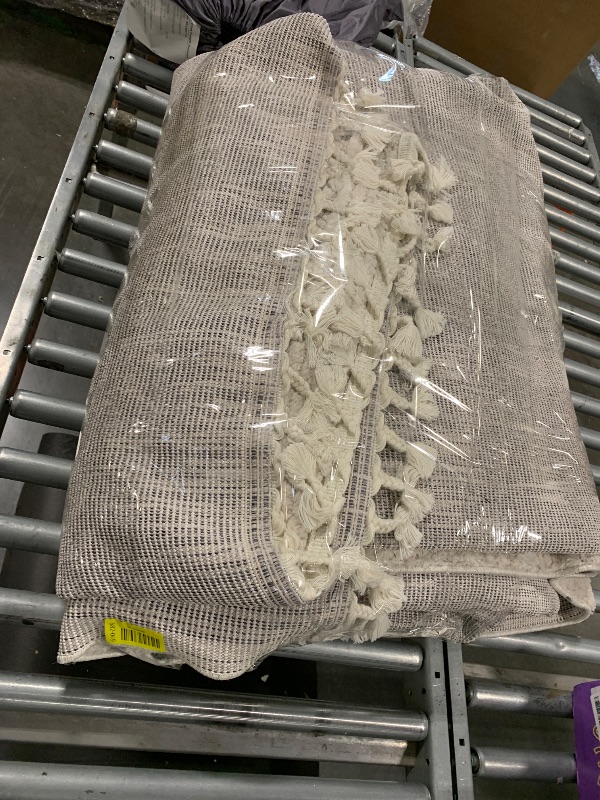 Photo 1 of **UNKNOWN MEASURES** AREA RUG