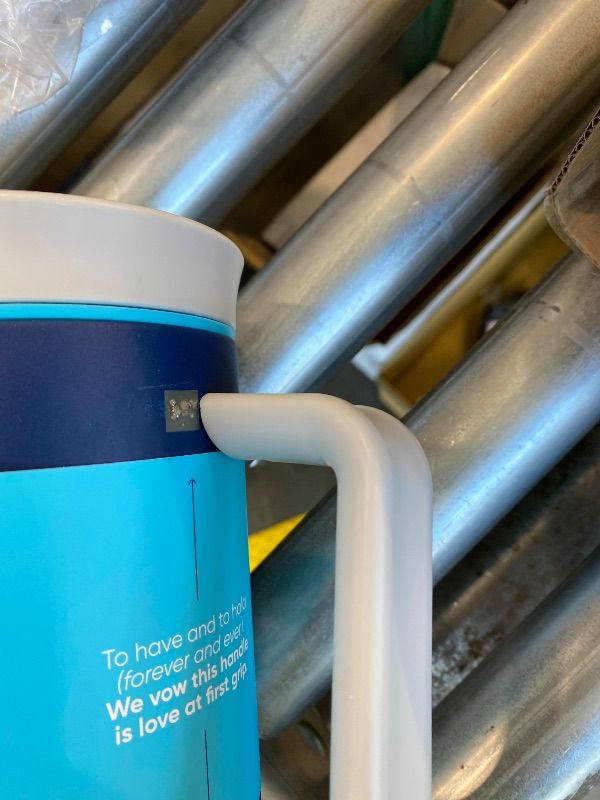 Photo 1 of ***BROKEN HANDLE*** ***MINOR DENT*** Owala Stainless Steel Triple Layer Insulated Travel Tumbler with Spill Resistant Lid, Straw, and Carry Handle, BPA Free, 40 oz, Dark Blue (Saltwater Starfish)