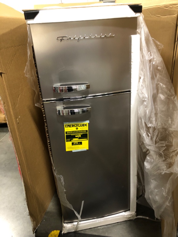 Photo 1 of ******MINOR DENTS***** Frigidaire, 2 Door Apartment Size Refrigerator/Freezer Combo, 7.5 cu ft, Platinum Series, Stainless, 23" D x 21.5" W x 55.5" H