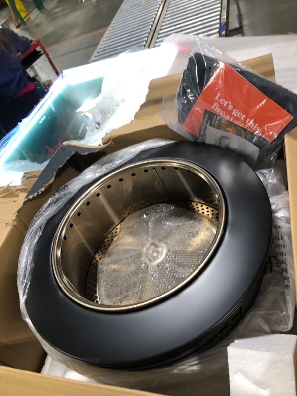 Photo 1 of *****FACTORY SEALED****TIKI Patio Fire Pit Bundle – 25-Inch Smokeless Wood Burning Outdoor Fire Pit for Backyard, Patio, Deck & Garden with Removable Ash Pan, Stand & Weather-Resistant Cover – Modern Black Stainless Steel