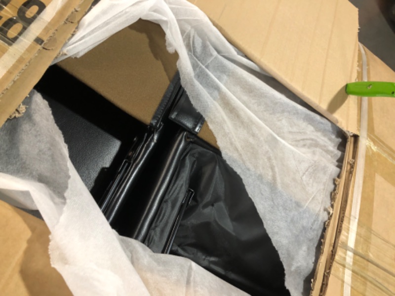 Photo 1 of ****STOCK PHOTO REFERENCE ONLY****FACTORY SEALED***Signature Design by Ashley Caveman Den Modern Faux Leather Power Reclining Sofa with Adjustable Headrest, Drop Down Table, Electrical Outlets and LED Reading Lights, Black