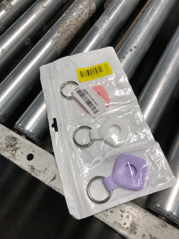 Photo 1 of ***PARTIAL SET - PRICE ADJUSTED*** Feigand 4 Pack Case for Tile Mate 2024 Tracker, Soft Silicone Holder Anti-Scratch Finder Protective Cover with Carabiner Accessories (Black+White+Purlple+Pink)