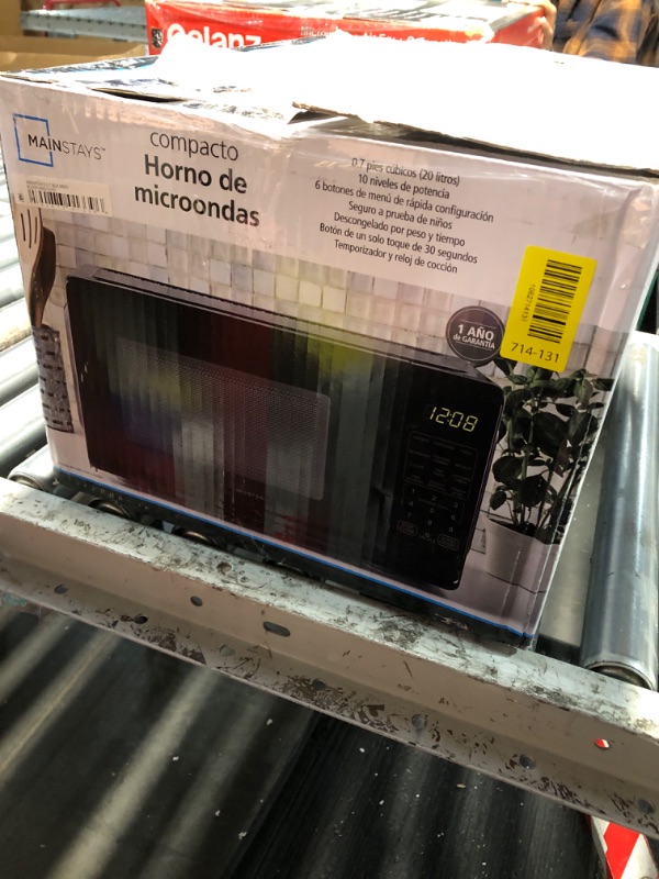 Photo 1 of  Mainstays 0.7 Cu ft Countertop Microwave Oven, 700 Watts, Black