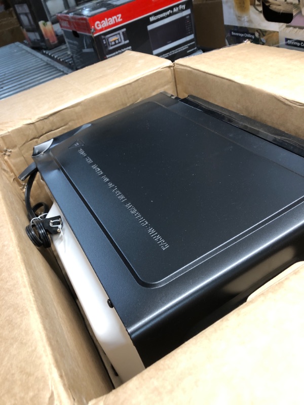 Photo 1 of ***DAMAGED - SEE NOTES/PICTURES***Hamilton Beach 0.9 Cu ft Countertop Microwave Oven, 900 Watts, Stainless Steel, New