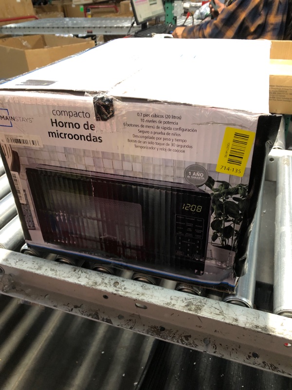 Photo 1 of Mainstays 0.7 Cu ft Countertop Microwave Oven, 700 Watts, Black
