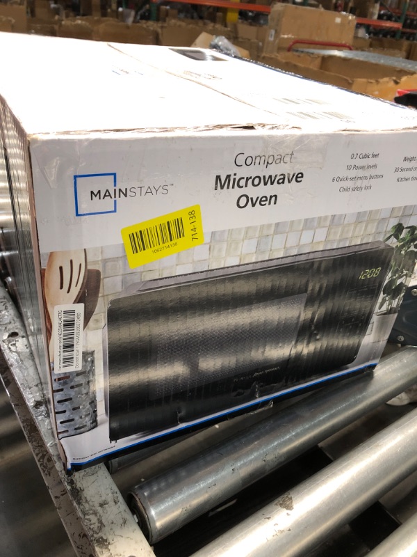 View 4 of Mainstays 0.7 Cu ft Countertop Microwave Oven, 700 Watts, Black