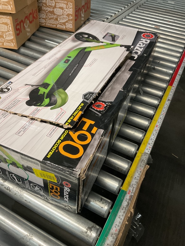 Photo 1 of ***MISSING PARTS***
MINOR DAMAGE*****
Razor Green Label E90 Electric Scooter for Kids Age 8 and Up, Power Core High-Torque Hub Motor, Up to 10 mph, All-Steel Frame