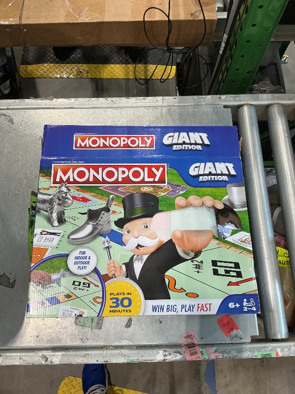 Photo 1 of **MISSING PARTS**
Spin Master Games, Monopoly Giant Edition, Classic Family Board Game for Indoor & Outdoor Play with Oversized Board, Screenless Activity, 2-4 Players, for Ages 6 & Up