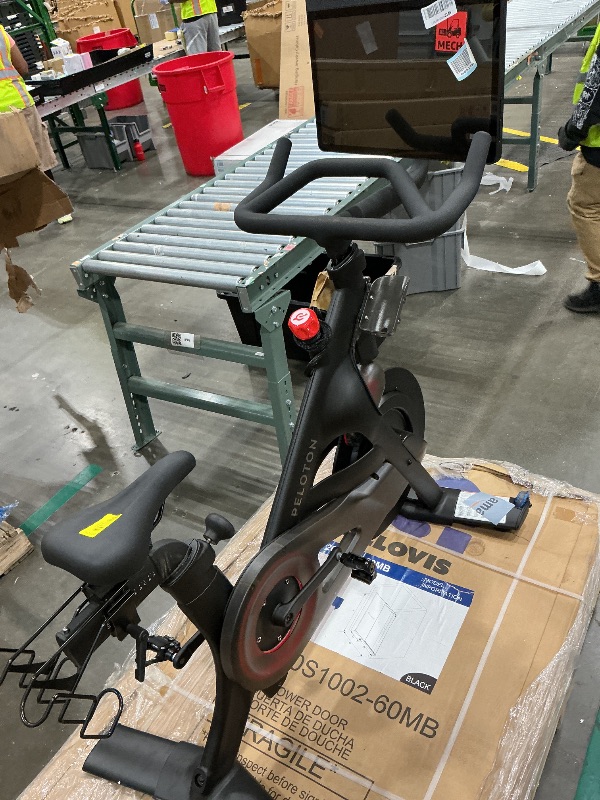 Photo 1 of *NON-FUNCTIONAL*
Peloton Exercise Cross Training Bike, Indoor Stationary Spin Bike for Home Workouts, Space-Friendly Exercise Equipment for Cardio and strength Workout & Indoor Cycling