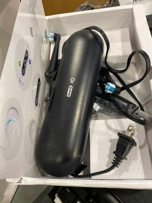Photo 1 of **UNTESTED**
Oral-B Rechargeable Electric Toothbrush, iO10 Ultimate Clean, 7 Cleaning Modes, Interactive Display, iSense Charger, Charging Travel Case, 4 Brush Heads, Rechargeable Toothbrush, Black