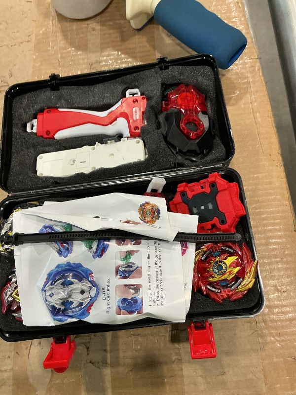 Photo 1 of **UNKNOWN IF MISSING PARTS**
Daoyehsy Bey Battle Top Burst Metal Fusion Attack Set, Battling Tops Launchers Combat Battle Toy with Portable Storage Box Present for Kids (007B)