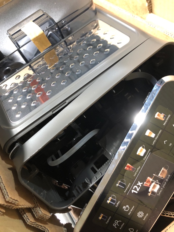 Photo 1 of ***DAMAGED - SEE NOTES/PICTURES*** Philips 4400 Series Fully Automatic Espresso Machine, LatteGo Milk System, Integrated Grinder, 12 Hot & Iced Coffee Pre-Sets, Quick Start, SilentBrew, 15-Bar Pressure, Black Chrome (EP4444/90)