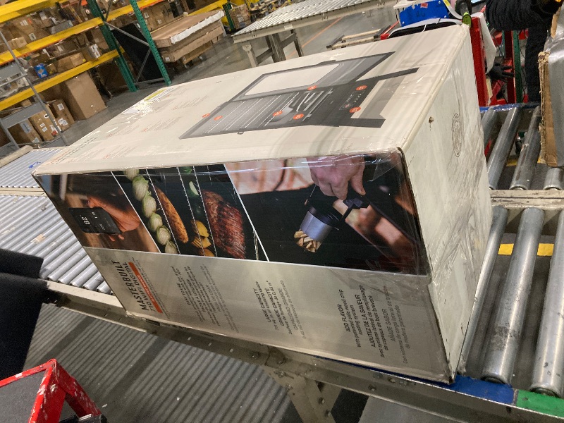 Photo 1 of ** UNTESTED * Masterbuilt®710 WiFi Digital Smoker, Vertical Design, 711 Cooking Sq. Inches, 4 Chrome Coated Smoking Racks, Wood Chip Loader, Electric Fuel Source to Plug in and Start Cooking, Black Model MB20070924