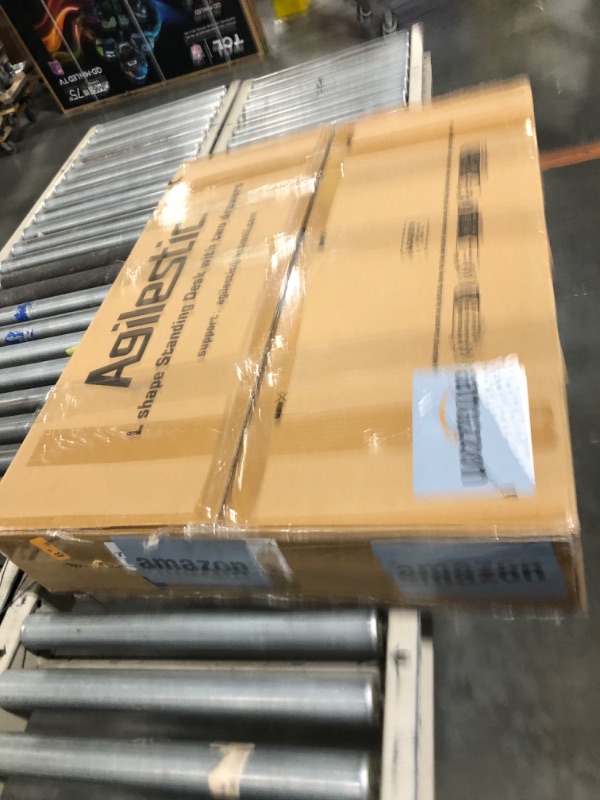 Photo 1 of  L Shaped Standing Desk with 2 Drawers and Keyboard Tray, Electric Sit to Stand Home Office Comupter Table, Ergonomic Corner Gaming Desk, Rustic Brown