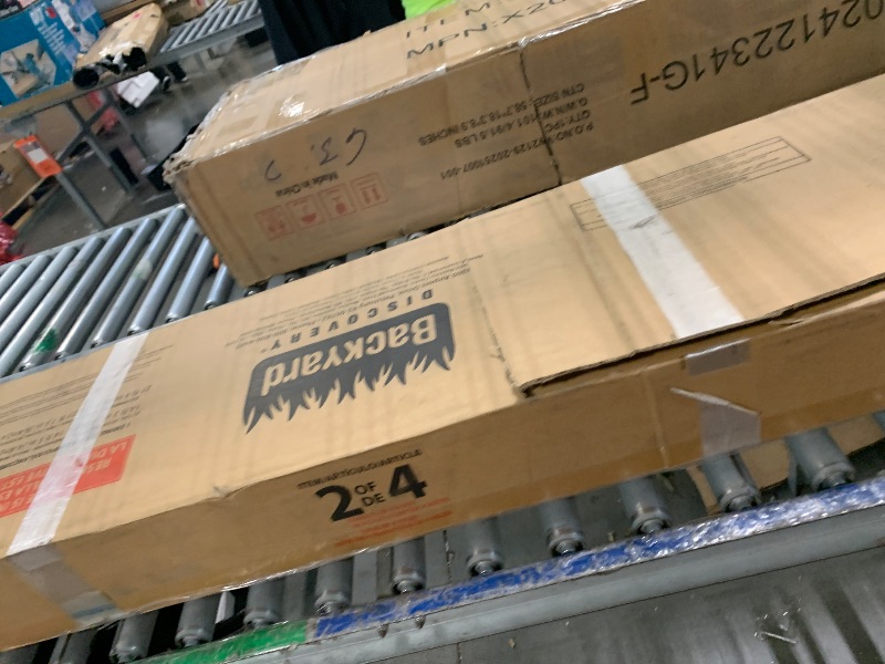 Photo 1 of ****PARTIAL SET, BOX 2/4 ONLY**** Backyard Discovery Beach Front Cedar Wood Swing Set with Wave Slide, Play Deck, Monkey Bars, Rock Wall Ladder, Shaded Picnic Area, Snack Bar, Belt Swings, Trapeze, Sandbox Area, Outdoor Playset