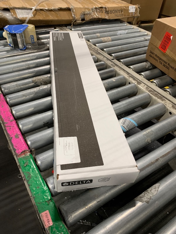 Photo 1 of Delta Faucet 36-Inch Reversible Linear Shower Drain Trim in Champagne Bronze