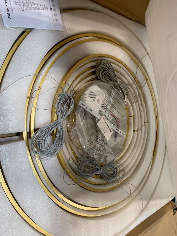 Photo 1 of Benkut 9 Rings Modern LED Chandelier Gold Dimmable Large Foyer Chandeliers Entryway High Ceiling for Staircase, High Ceiling Pendant Lights for Entryway Living Room, 3000K-6500K CCT