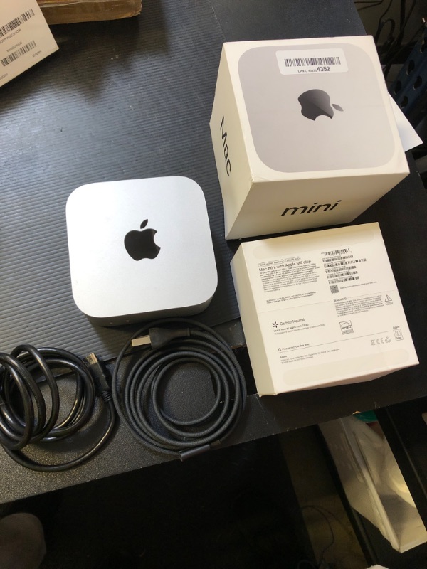 Photo 1 of Apple 2024 Mac mini Desktop Computer with M4 chip with 10?core CPU and 10?core GPU: Built for Apple Intelligence, 16GB Unified Memory, 256GB SSD Storage, Gigabit Ethernet. Works with iPhone/iPad